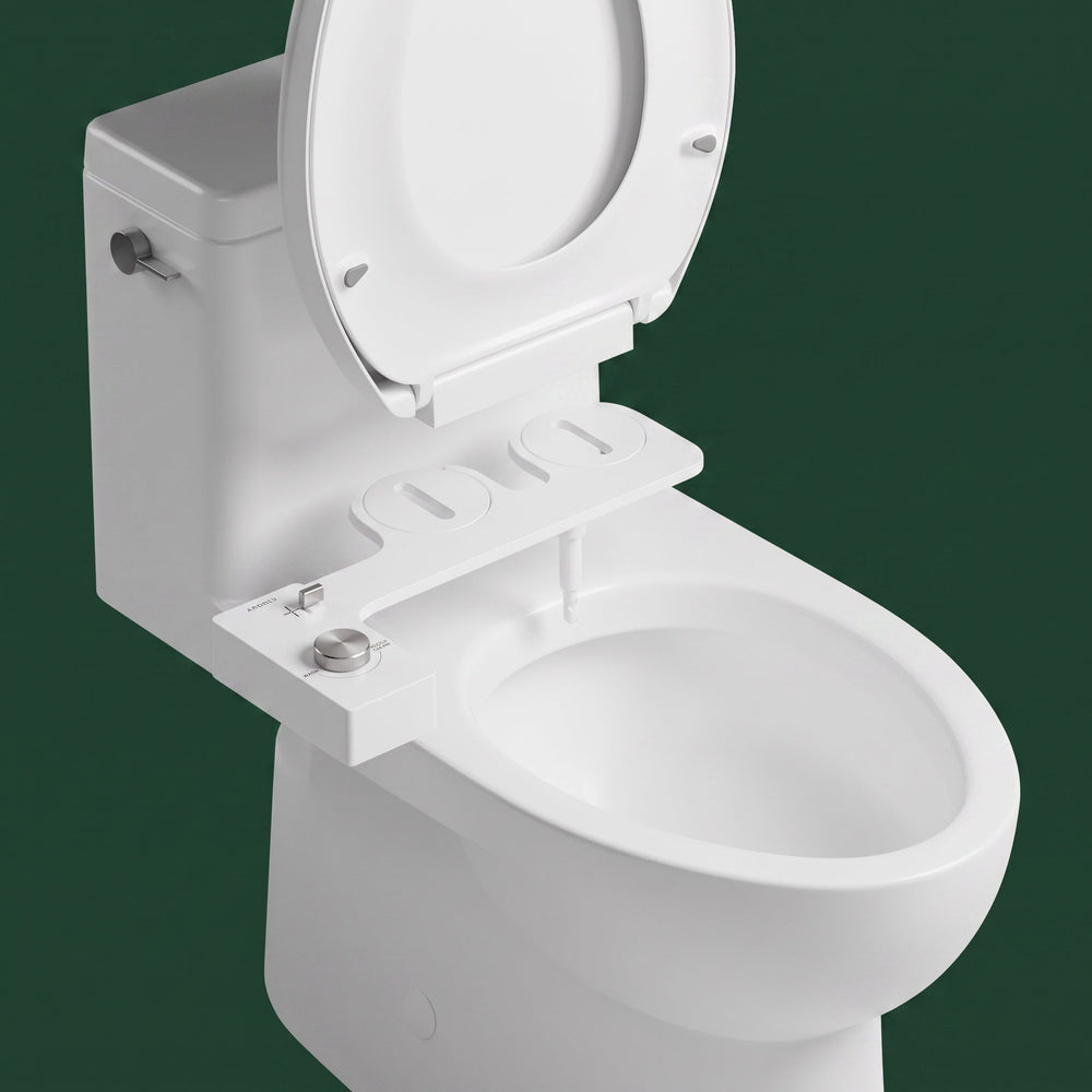 The Original installed under the seat of a standard two-piece toilet